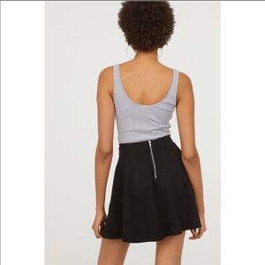 Flirty black circle skirt with exposed back zipper